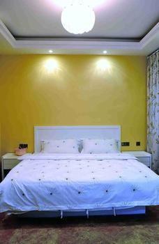 Fenghuang Yiguangnian Fashion Hotel Exterior foto